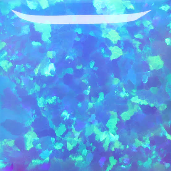 Opal Cross Tooth Gem